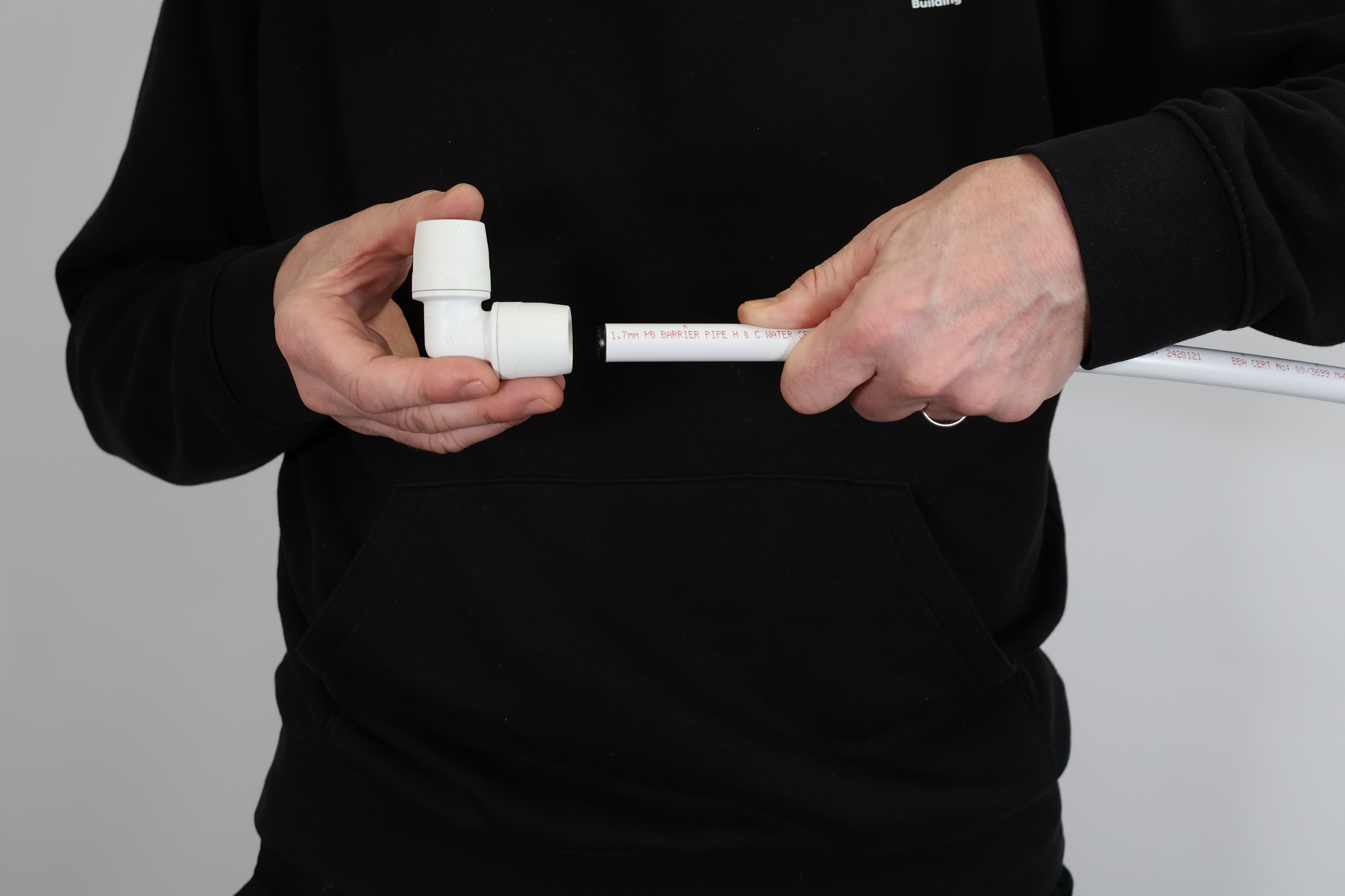Incerting the Pipe Stiffener into Polypipe Building Products Pro-Straight Polybutylene pipe