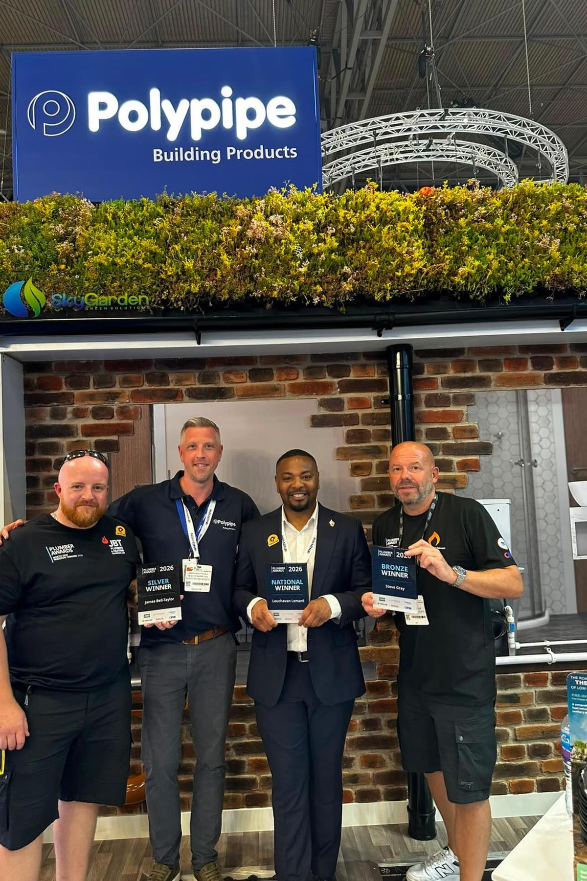 Plumber Award Winners on Stand.jpg