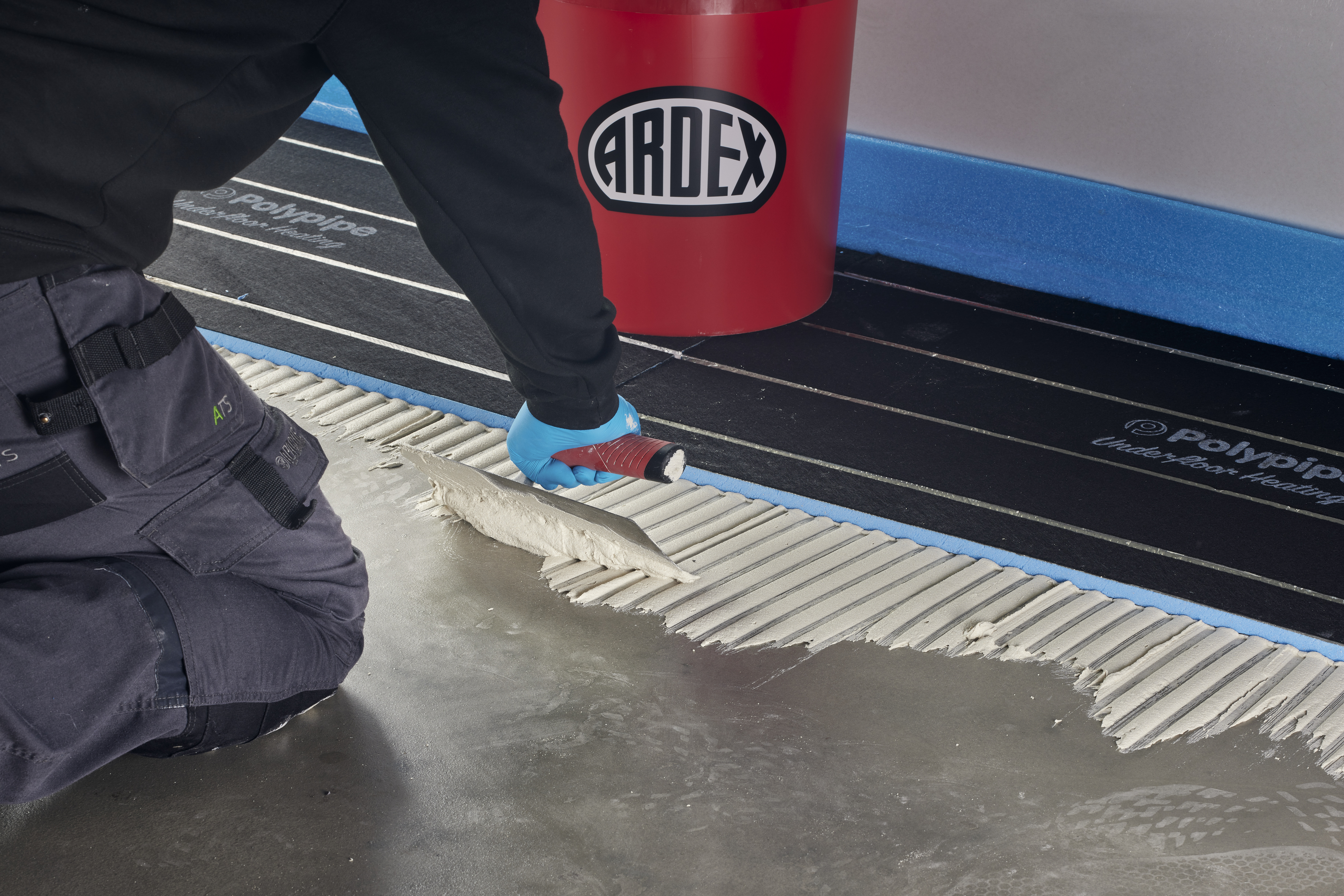 Polypipe Overlay direct onto screed with tile adhesive.jpg
